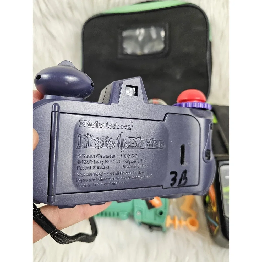 Nickelodeon Photo Blaster Camera, Slime Lunchbox, Lazer Light, and Flash Screen